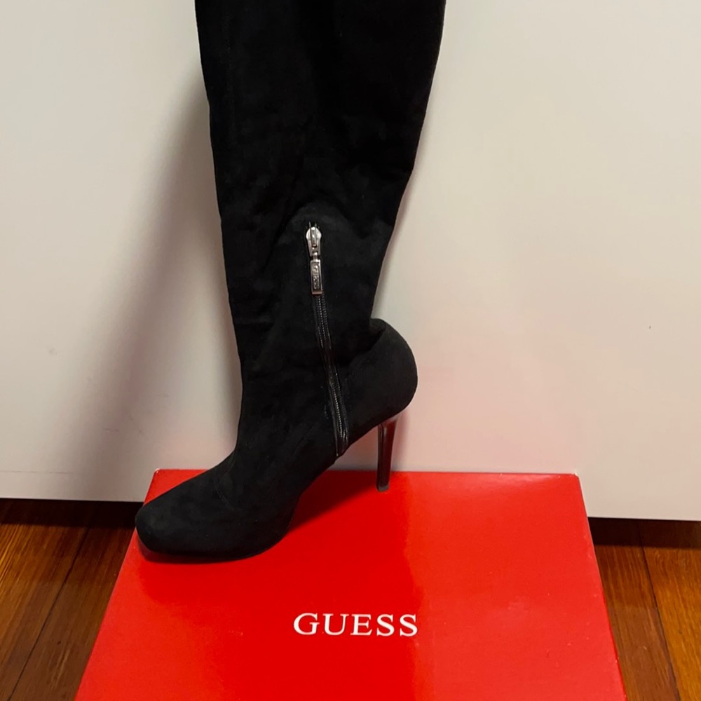 Knee high heeled Guess boots